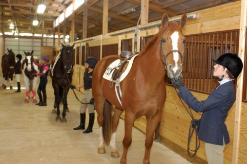 Albion College students at the Held Equestrian Center.