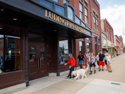 Students approach the Ludington Center in downtown Albion.